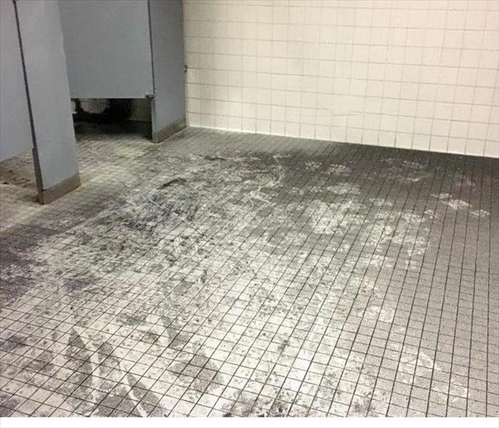 High school bathroom fire damage